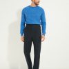 Pantalon en flanelle marine Scavini, coupe classique, porté avec veste et pull, silhouette sartoriale.