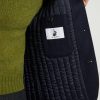Détail intérieur du gilet Maubourg Scavini en flanelle bleu marine, montrant le matelassage soigné.